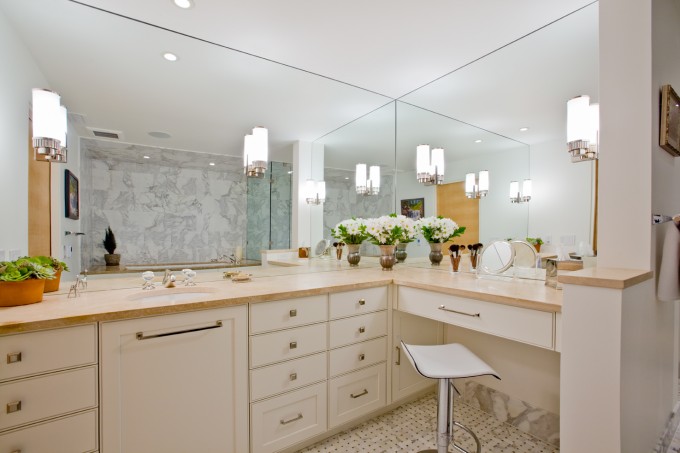 Huge bathroom mirrors for views from every angle in Minneapolis remodel.